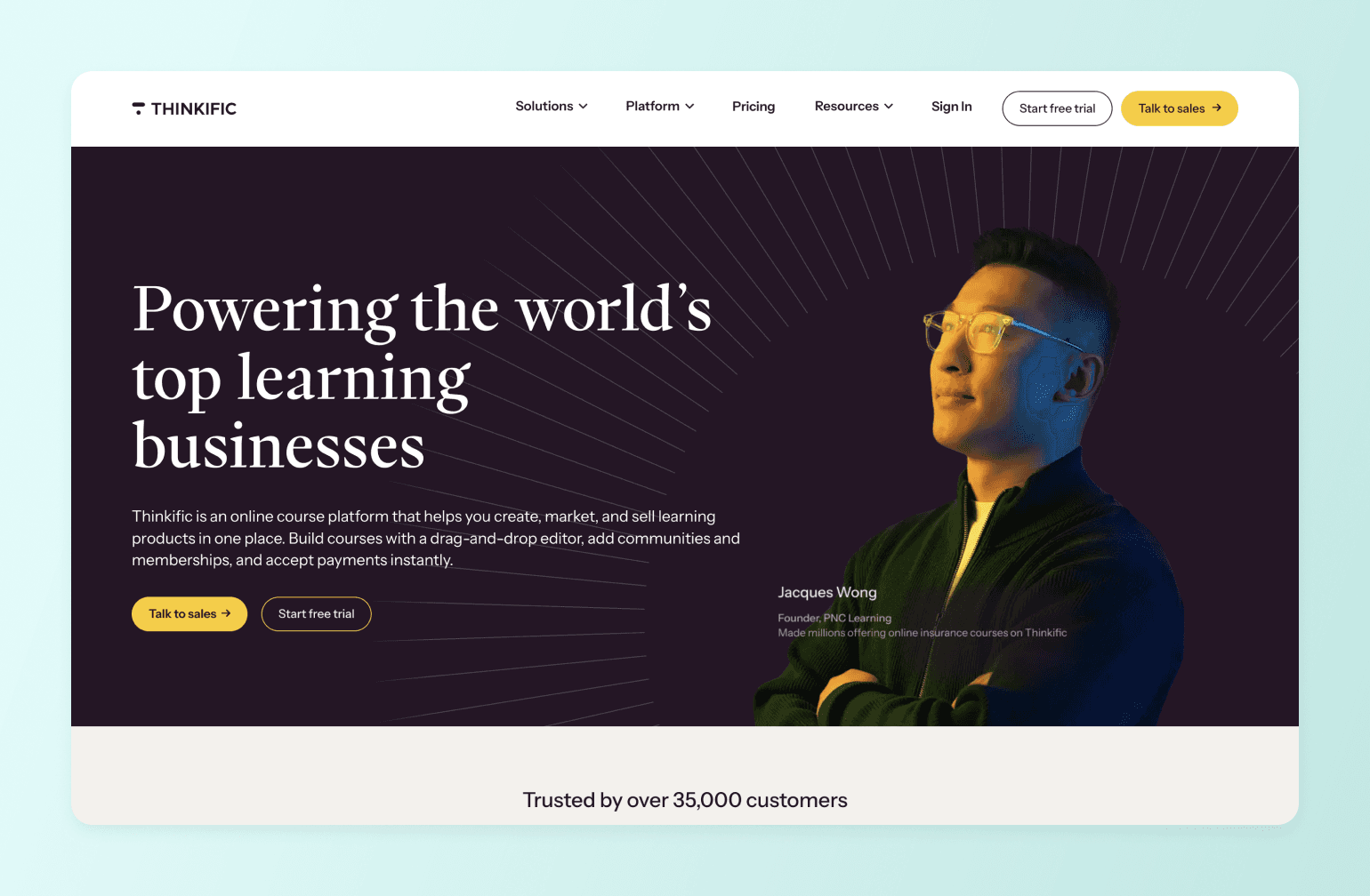 Thinkific online course platform homepage featuring Jacques Wong, Founder of PNC Learning, wearing yellow glasses against dark background with radiating lines
