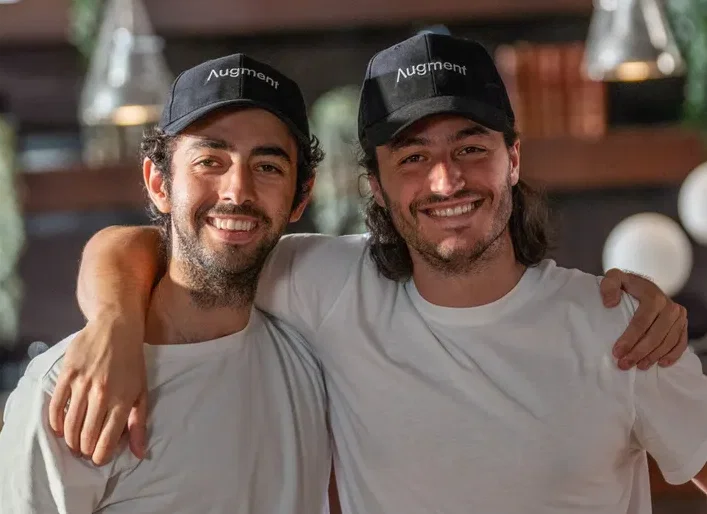 Ariel Renous and Roy Wellner, co-founders of Augment Business School, in Augment caps